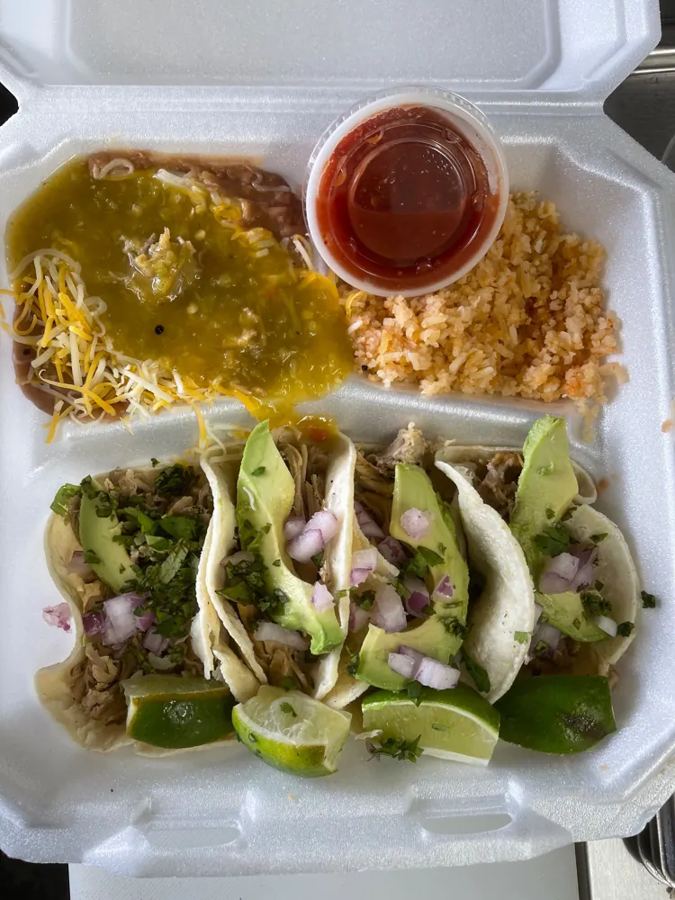 Bo's Street Tacos with avocado, onion and cilantro, with rice, beans and lime